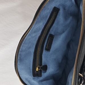 ZINA EVA Black textured vegan leather tasseled zipper closure